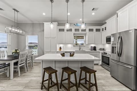 Elegant kitchen with a spacious island and dining area