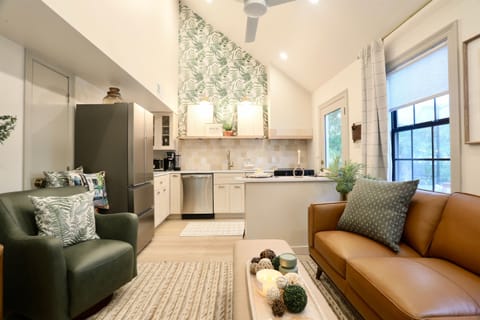 Sink into the luxurious leather sofa or get cozy in one of the swivel chairs.