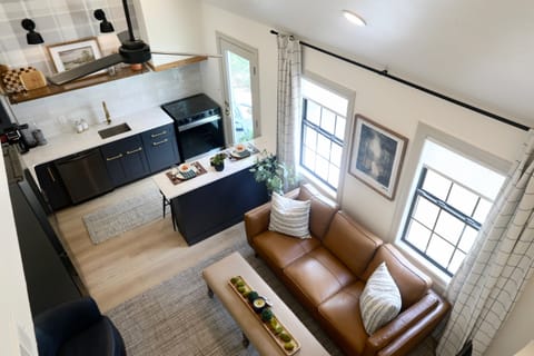 Gather in the open-concept kitchen and living room