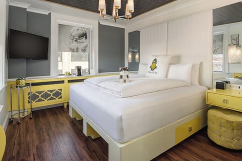 Sink into a cloud-soft bed in a bold, modern retreat.