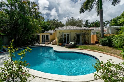 Dive into paradise!  Immerse yourself in the crystal-clear waters of this stunning pool oasis.