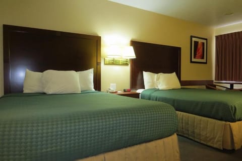 Unit with 2 Queen beds. Exact unit will be assigned upon arrival. Views, colors, and decor may vary.