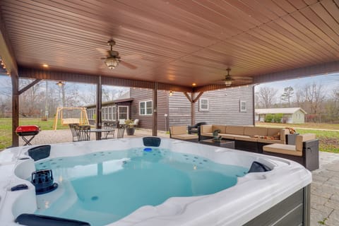 Covered Patio | Charcoal Grill | Private Hot Tub | Lounge & Dining Areas