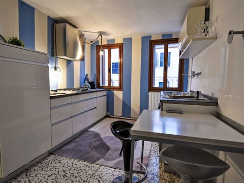 Kitchen, Kitchen Appliance, Major Appliance, Interior Design, Countertop, Flooring, Furniture, Cabinetry, Home Appliance, Kitchen Stove