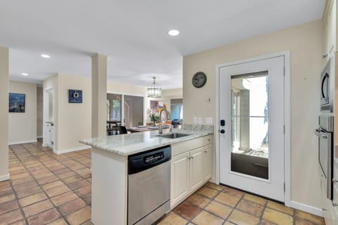 Open-concept layout with a cute yet functional chess table