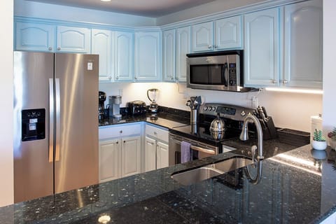 Looking into the kitchen from the bar area