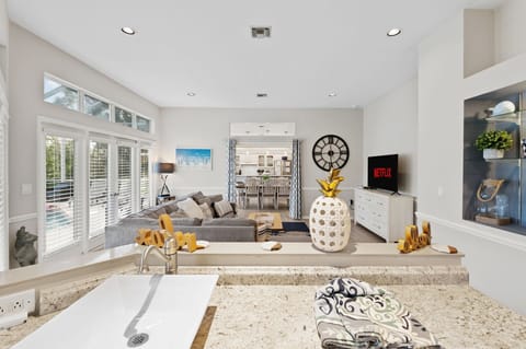 With an open floor plan, the space feels expansive and welcoming, ideal for gathering with loved ones.