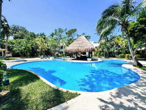 Sun-drenched shared poolside relaxation – pure bliss!