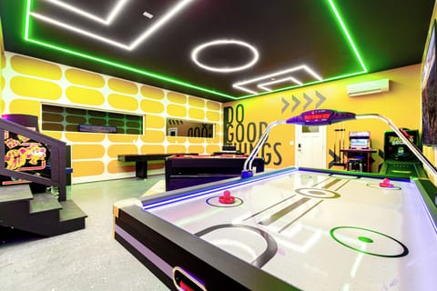 Step into a game-lover’s paradise! With a bold soccer-themed design and an outlined soccer field on the ceiling, this space is built for nonstop fun.
