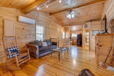 Main sitting area for your enjoyment that offers a fireplace and 50” television.