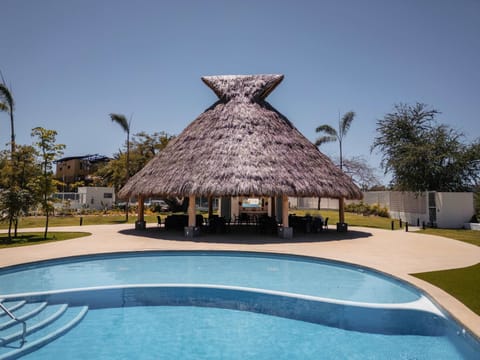 Shared pool, kids' pool, and palapa