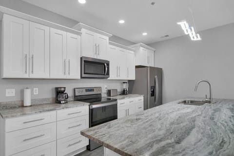 Kitchen with brand new stainless steel appliances