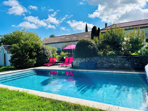 Heated 9 x 5 m pool looking towards vineyards and woodland