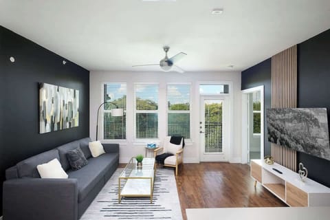 Kick Back and Relax in a Living Room with TV and Convertible Sofa
