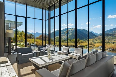 Living Room with Floor to Ceiling Windows and Panoramic Mountain Views
