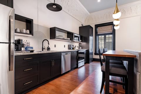 Fully equipped kitchen with modern appliances, offering everything you need for preparing meals or enjoying a morning coffee.