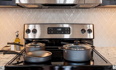 Kitchen essentials stocked in every suite.