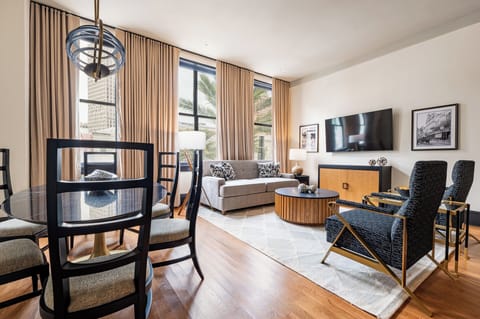 Living room 1 - Experience life on Canal Street from this spacious, connecting unit with contemporary design and panoramic views.