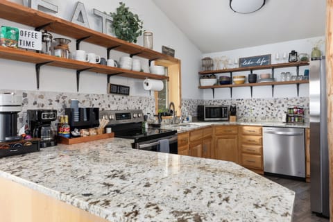 Cook, connect and caffeinate-this inviting kitchen is made for memorable moments