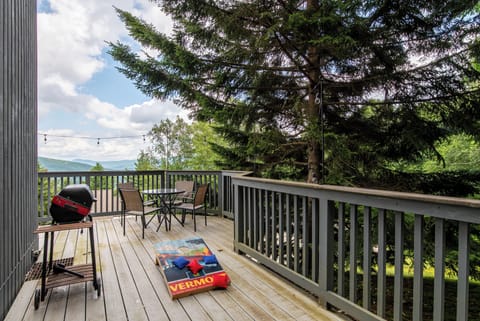 This scenic mountain -view deck offers a peaceful setting  overlooking the Green Mountains with outdoor seating a grill and Cornhole game adds entertainment to your mountain getaway
