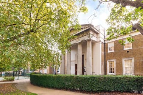 Exterior of building with reserved private gated free parking