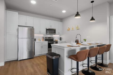 The fully equipped kitchen features sleek, modern appliances and ample counter space, making it easy to prepare your favorite meals. Whether you’re brewing a morning coffee or eating in. You will have everything you need to make your favorite meals.