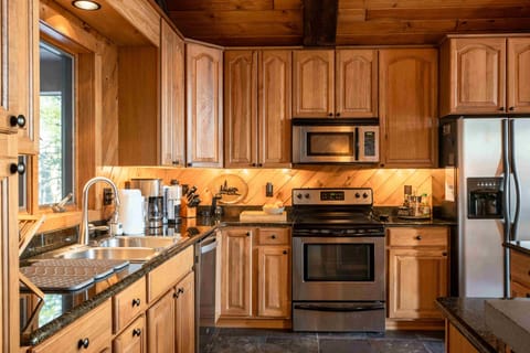 Spacious chefs kitchen with Island & bar seating. Fully equipped with appliances