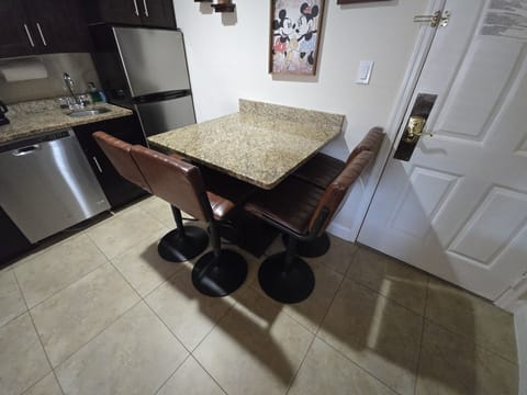 Bright and welcoming table for four—perfect for meals or game nights.