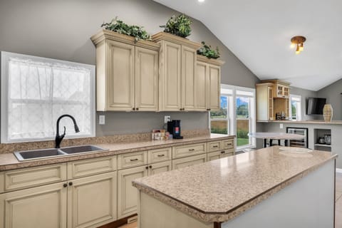 All open format, the kitchen flows into the bar and dining room