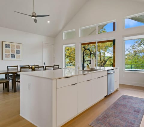 Bask in the glow. This bright, airy space blends clean lines and natural light to make every moment feel like a breath of fresh air.