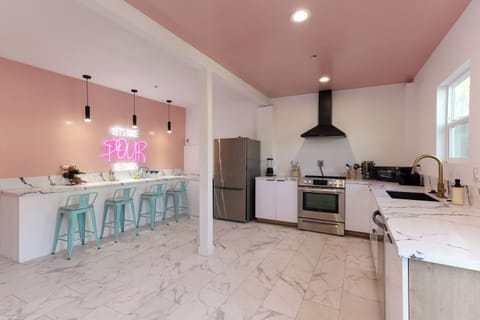 Entertain guests with flair in this sleek bar area.