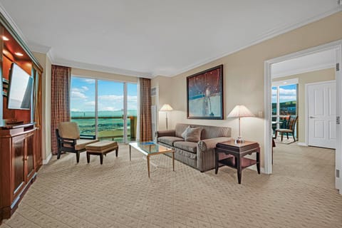 Guests will also appreciate the convenience of a full-size queen pull-out sofa in the living room, accompanied by their own private full bath with a walk-in shower.