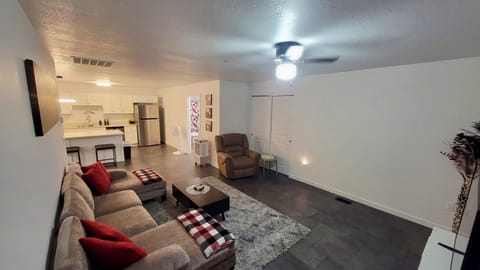 Comfortable open living with TV and Fireplace.