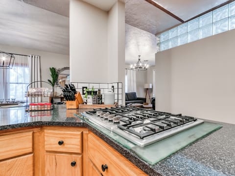 Everything you need to whip up a meal—just bring your appetite. We've got the gas stovetop and 11-piece Cuisinart cookware set waiting for you!