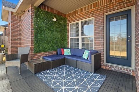 Spend time outside in the private fully fenced in back yard with lounge seating.