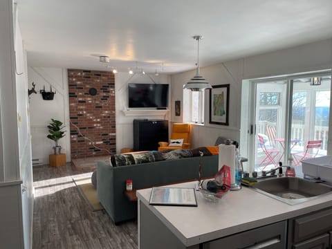 2nd floor living room with brand new Samsung smart TV.