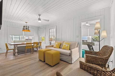 This second story condo has a pull out couch and comfy seating areas