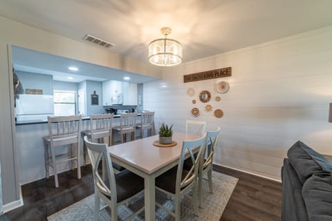 The dining table conveniently seats 6