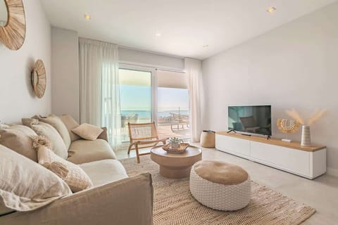 Stylish Living Room with big sliding doors opening directly on the terrace. Equipped with TV & WIFI