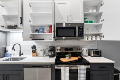 As you approach kitchen the elegant layout and well-stocked shelves make it the ideal spot to relax.