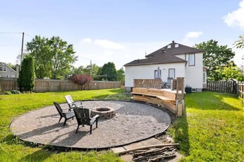 The house’s exterior is a blend of modern and classic design elements, creating a welcoming and stylish facade.