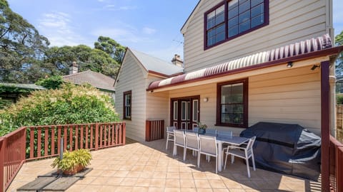 Perfect spot for entertaining, complete with a BBQ and dining set.
