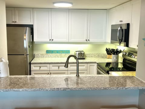 View of kitchen from dining room