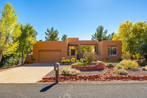 Welcome to Thunder Mountain View by PORTER! This stunning retreat nestled in the heart of West Sedona.