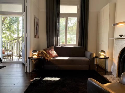 Living room, sofa bed converts into a queen-sized bed for guests 3 and 4.