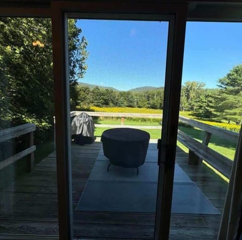 Backyard Deck with BBQ Grill and Lounge Table and Chairs