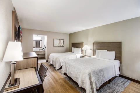 Unit with 2 Full beds. Exact unit will be assigned upon arrival. Views, colors, and decor may vary.