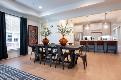 The dining table gives you access to every thing important during family or friends gatherings. Including the Half Bathroom that is located just behind the table.