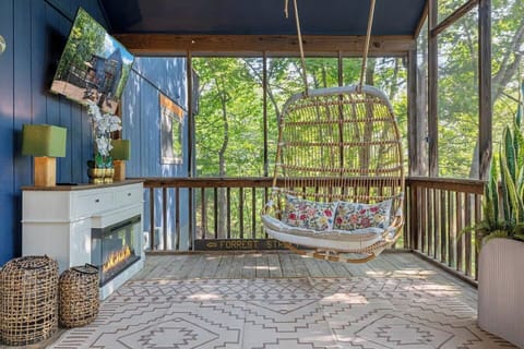 One of our favorite spots to unwind  A covered deck with a hanging swing, Smart 