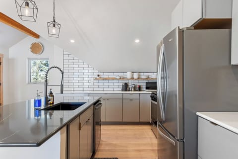 Cook up a feast in this fully stocked kitchen, equipped with modern appliances